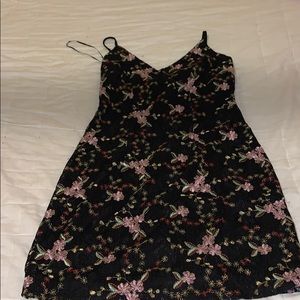 Black mini dress with floral threading